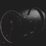 black and gray vehicle cluster panel displaying at 0