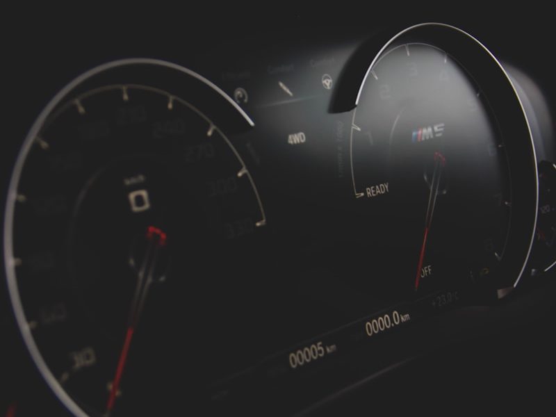 black and gray vehicle cluster panel displaying at 0