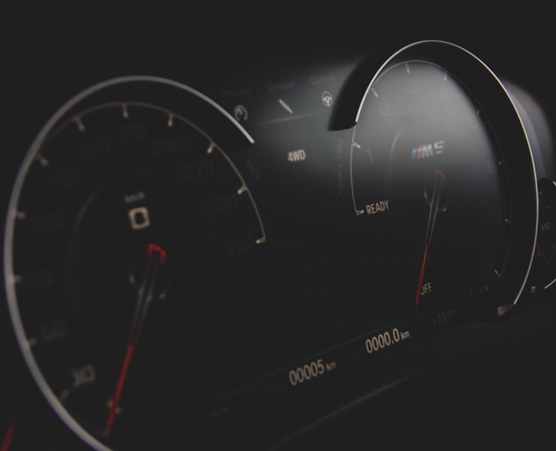 black and gray vehicle cluster panel displaying at 0